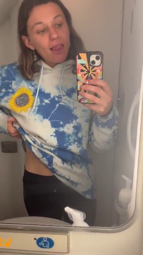 Hippie teen sending nudes on a plane