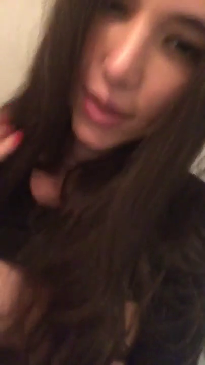 Hot busty brunette finguering herself on the plane