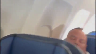 Russian chick shows tits to american on the flight