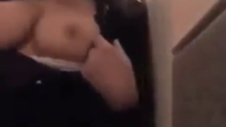 Sexy brunnete finguering herself in the plane bathroom